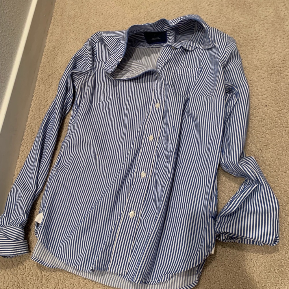 Blue and white striped polo
